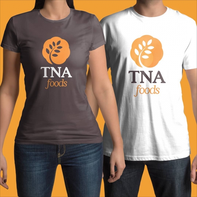 A nova marca da TNA Foods é elegante e sofisticada, com cores marcantes e contrastantes, ao mesmo tempo que é moderna e cheia de vida. Seu símbolo é composto por diversos círculos, representando a união, e também um ramo com folhas, representando os produ para TNA Foods